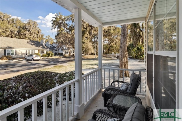 balcony featuring covered porch