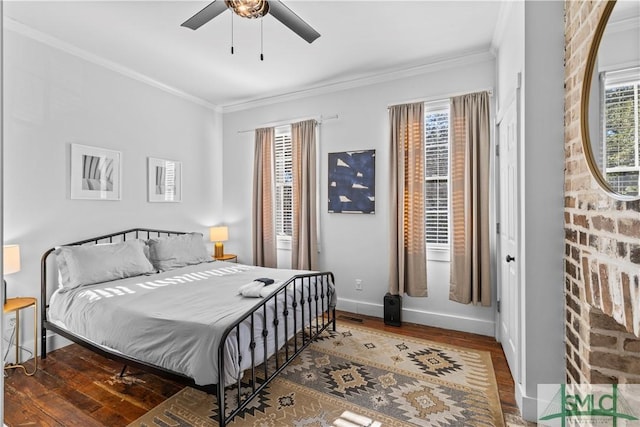 bedroom with multiple windows, crown molding, dark hardwood / wood-style flooring, and ceiling fan