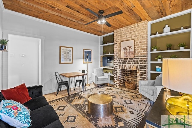 living room with ceiling fan, a fireplace, wood ceiling, and built in shelves