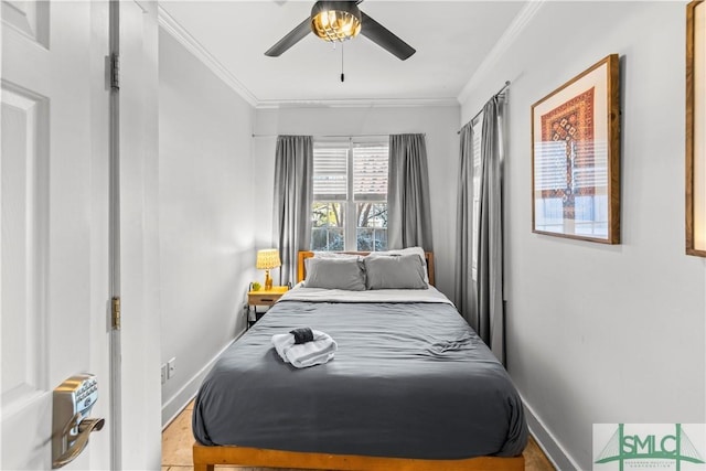 bedroom featuring crown molding and ceiling fan