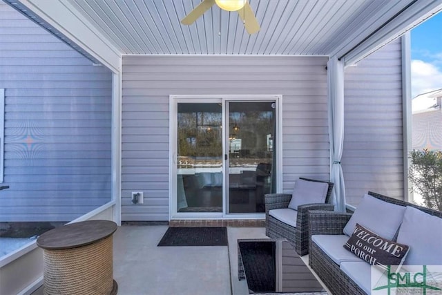 view of patio featuring ceiling fan and an outdoor living space