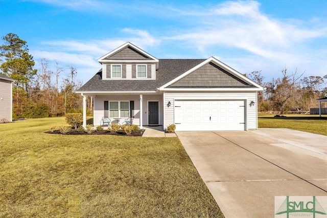 view of front of home featuring a garage, covered porch, and a front yard