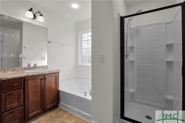 bathroom featuring vanity, separate shower and tub, and tile patterned flooring