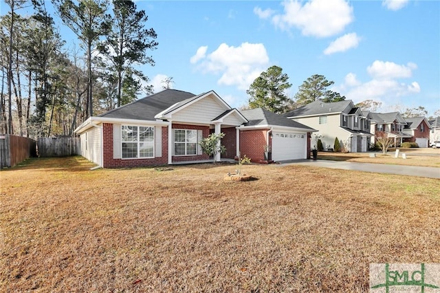 view of front facade with a garage and a front lawn