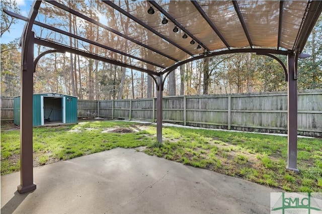 view of patio / terrace with a storage shed