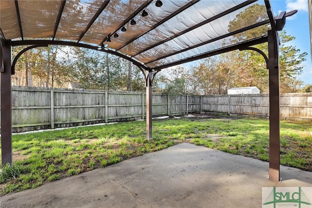 view of patio featuring a pergola