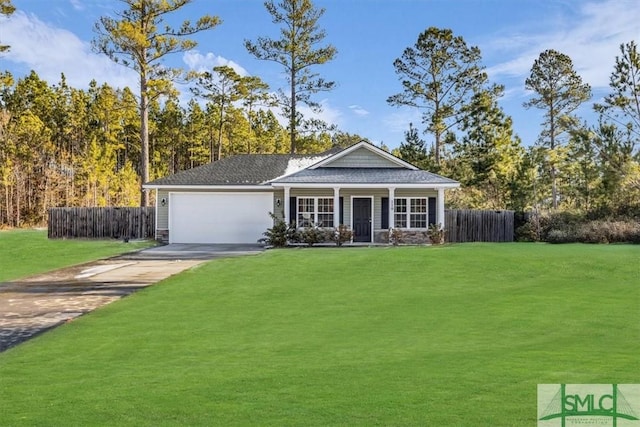 single story home with a garage, a front yard, and covered porch