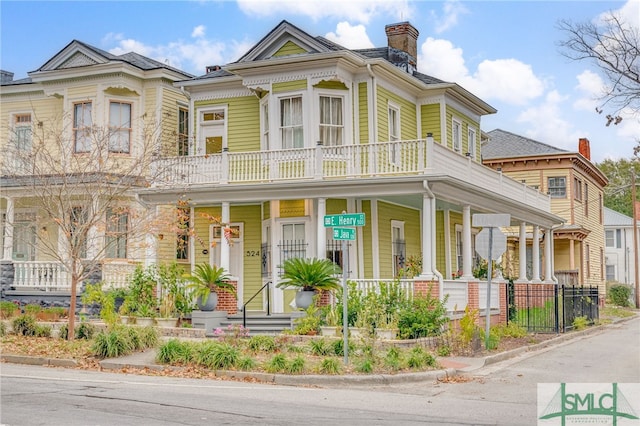 victorian home with a balcony