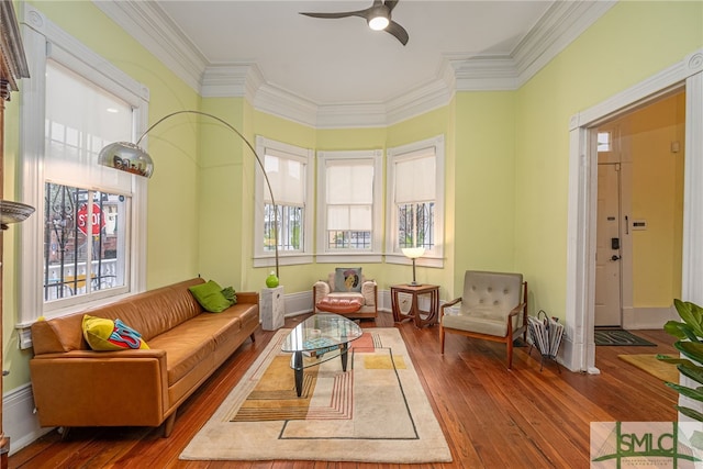 524 E Henry St, Savannah, GA 31401 - living room featuring hardwood / wood-style flooring, a ceiling fan, healthy amount of natural light, and crown molding