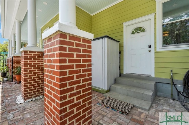 524 E Henry St, Savannah, GA 31401 - property entrance featuring covered porch