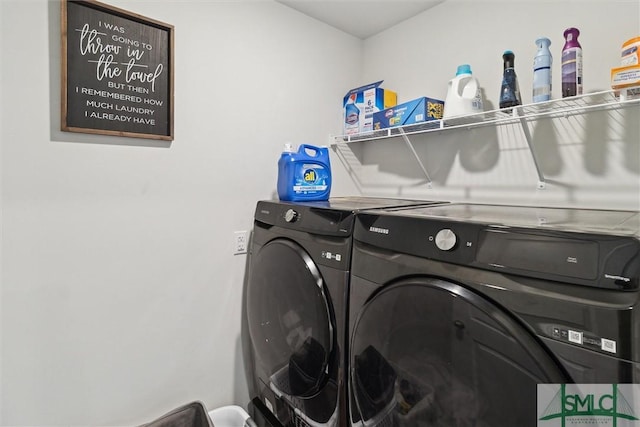 laundry room with separate washer and dryer