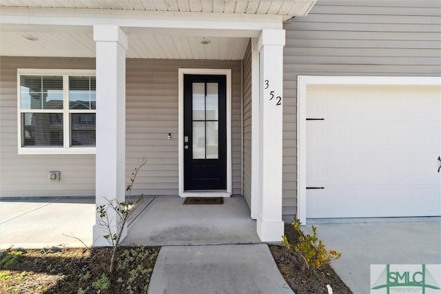 property entrance featuring a garage