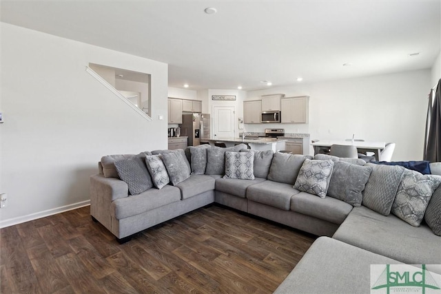 living room featuring dark hardwood / wood-style floors