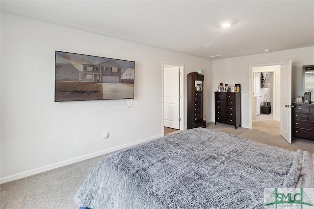 bedroom with light carpet