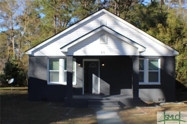 bungalow-style house featuring covered porch