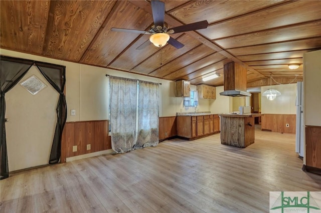 kitchen with lofted ceiling, custom range hood, decorative light fixtures, wooden ceiling, and white fridge