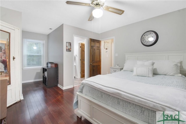 bedroom featuring ceiling fan and dark hardwood / wood-style floors