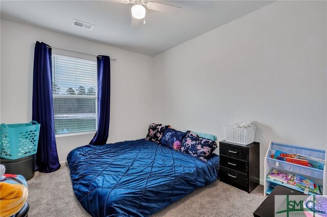 176 Coneflower Rd, Bloomingdale, GA 31302 - bedroom with light colored carpet and ceiling fan