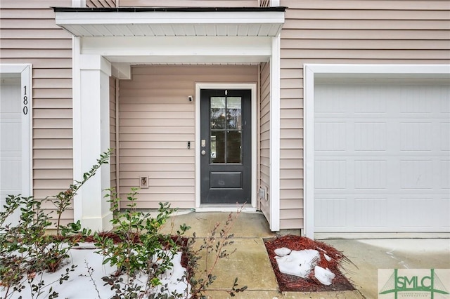 176 Coneflower Rd, Bloomingdale, GA 31302 - doorway to property featuring a garage