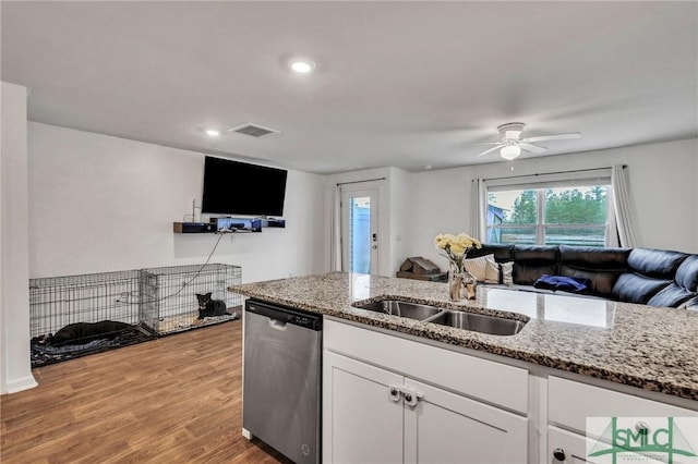 176 Coneflower Rd, Bloomingdale, GA 31302 - kitchen featuring light hardwood / wood-style flooring, ceiling fan, dishwasher, white cabinetry, and light stone countertops