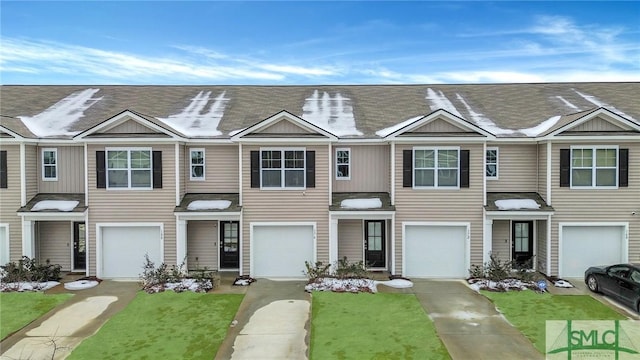 176 Coneflower Rd, Bloomingdale, GA 31302 - townhome / multi-family property featuring a front yard