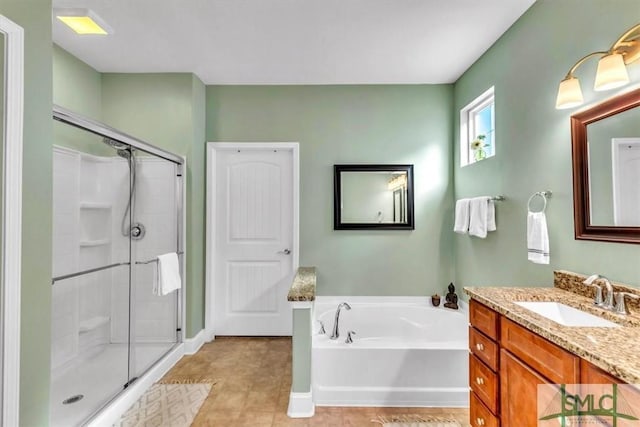 bathroom featuring vanity, separate shower and tub, and tile patterned flooring