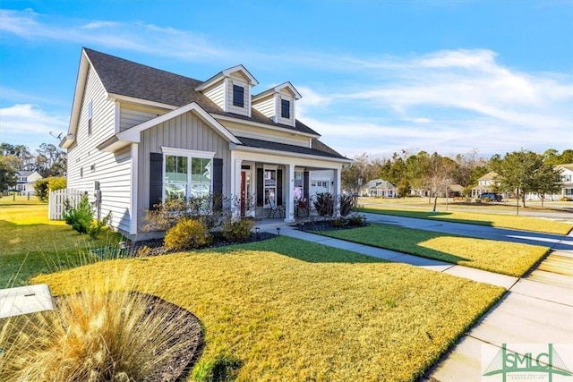 view of front facade featuring a porch and a front yard