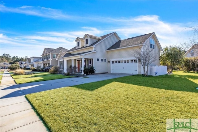 view of front of property with a garage and a front lawn