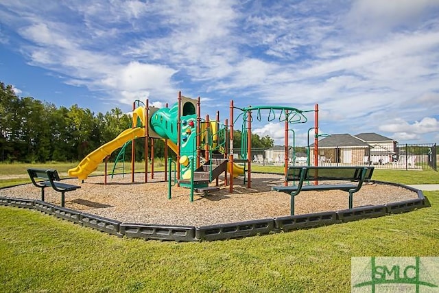 view of playground with a yard