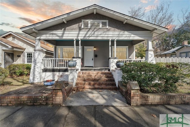 bungalow-style home featuring a porch