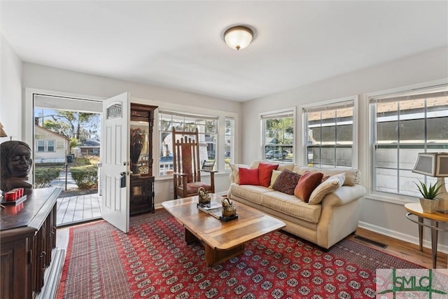 living room featuring hardwood / wood-style flooring and plenty of natural light