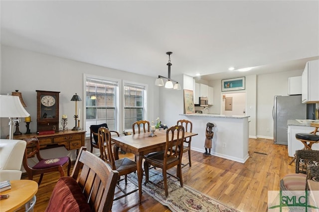 dining area featuring light hardwood / wood-style flooring