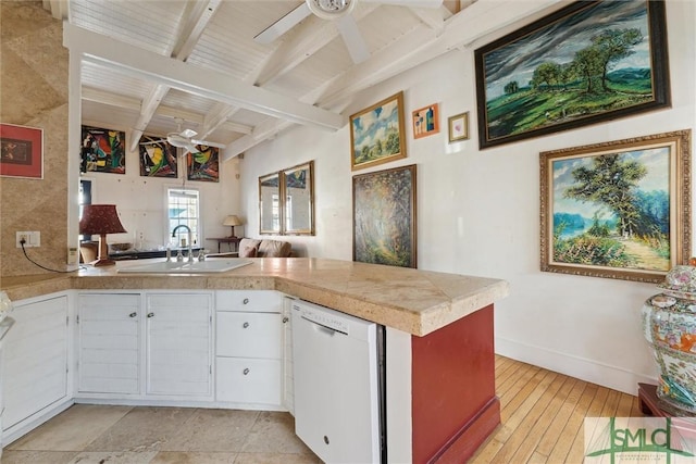 kitchen featuring white cabinetry, dishwasher, sink, ceiling fan, and kitchen peninsula