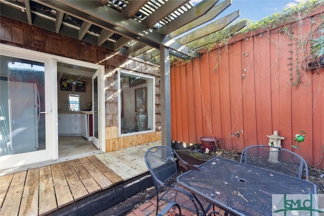 wooden terrace featuring a pergola