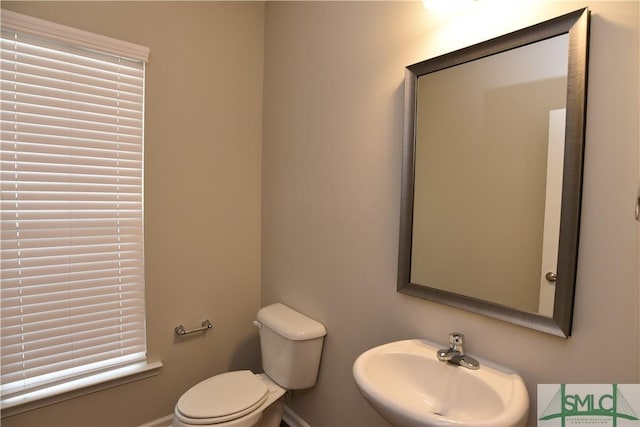 bathroom with sink and toilet