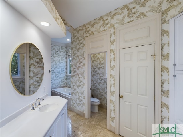 bathroom with vanity, tile patterned floors, and toilet