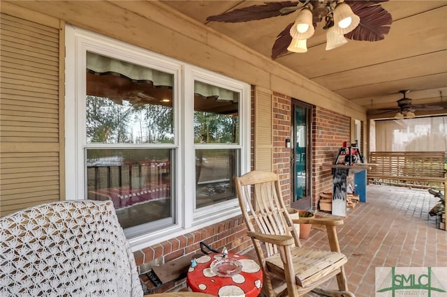 exterior space featuring a porch and ceiling fan