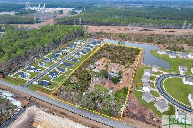 aerial view featuring a water view