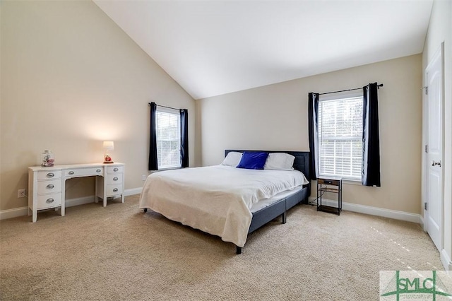 carpeted bedroom featuring high vaulted ceiling