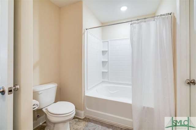 bathroom with shower / bathtub combination with curtain and toilet