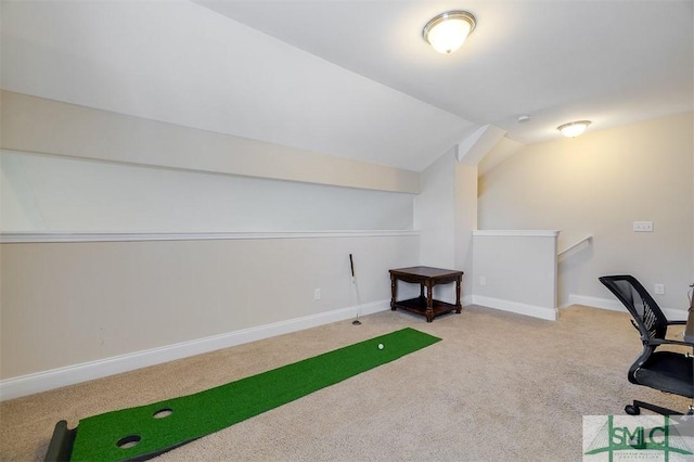 office featuring lofted ceiling, carpet floors, and golf simulator