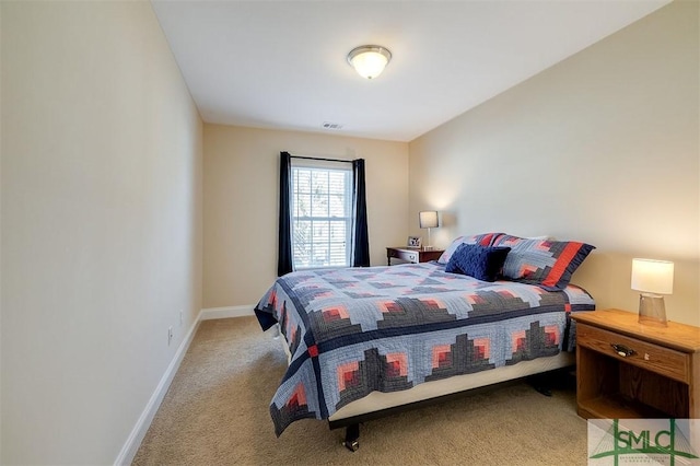 bedroom featuring light colored carpet