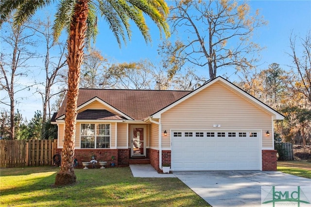 ranch-style home featuring a garage and a front lawn