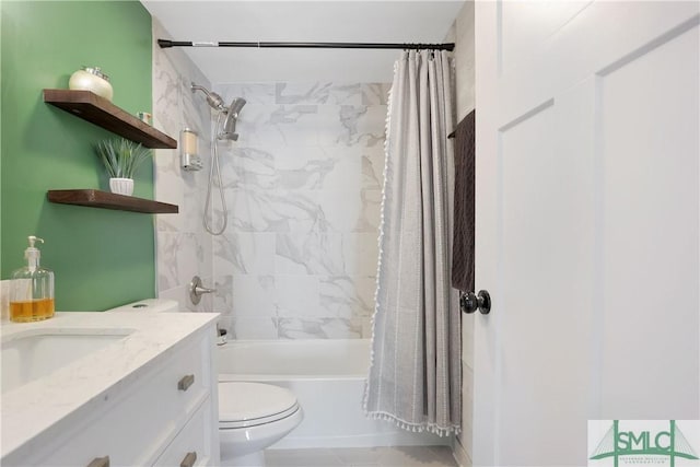 full bathroom featuring shower / tub combo, vanity, and toilet