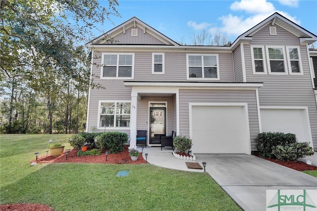 view of front of home featuring a garage and a front lawn