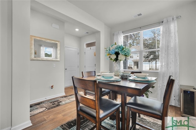 dining area featuring hardwood / wood-style floors