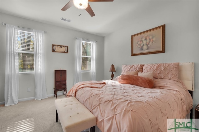 carpeted bedroom with ceiling fan