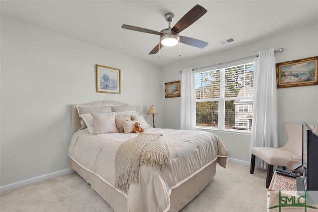 carpeted bedroom with ceiling fan