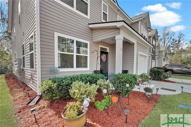 view of home's exterior with a garage