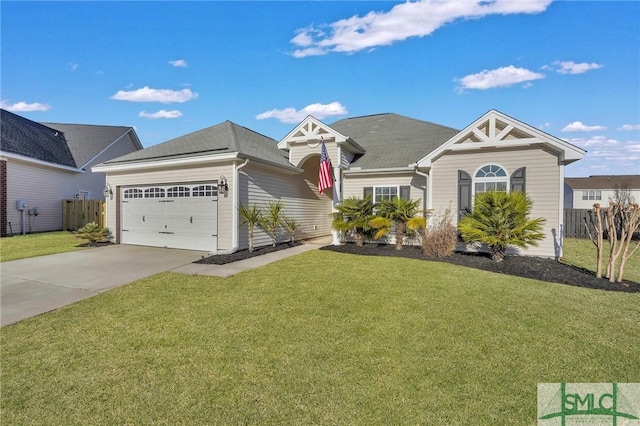 view of front of house featuring a garage and a front lawn